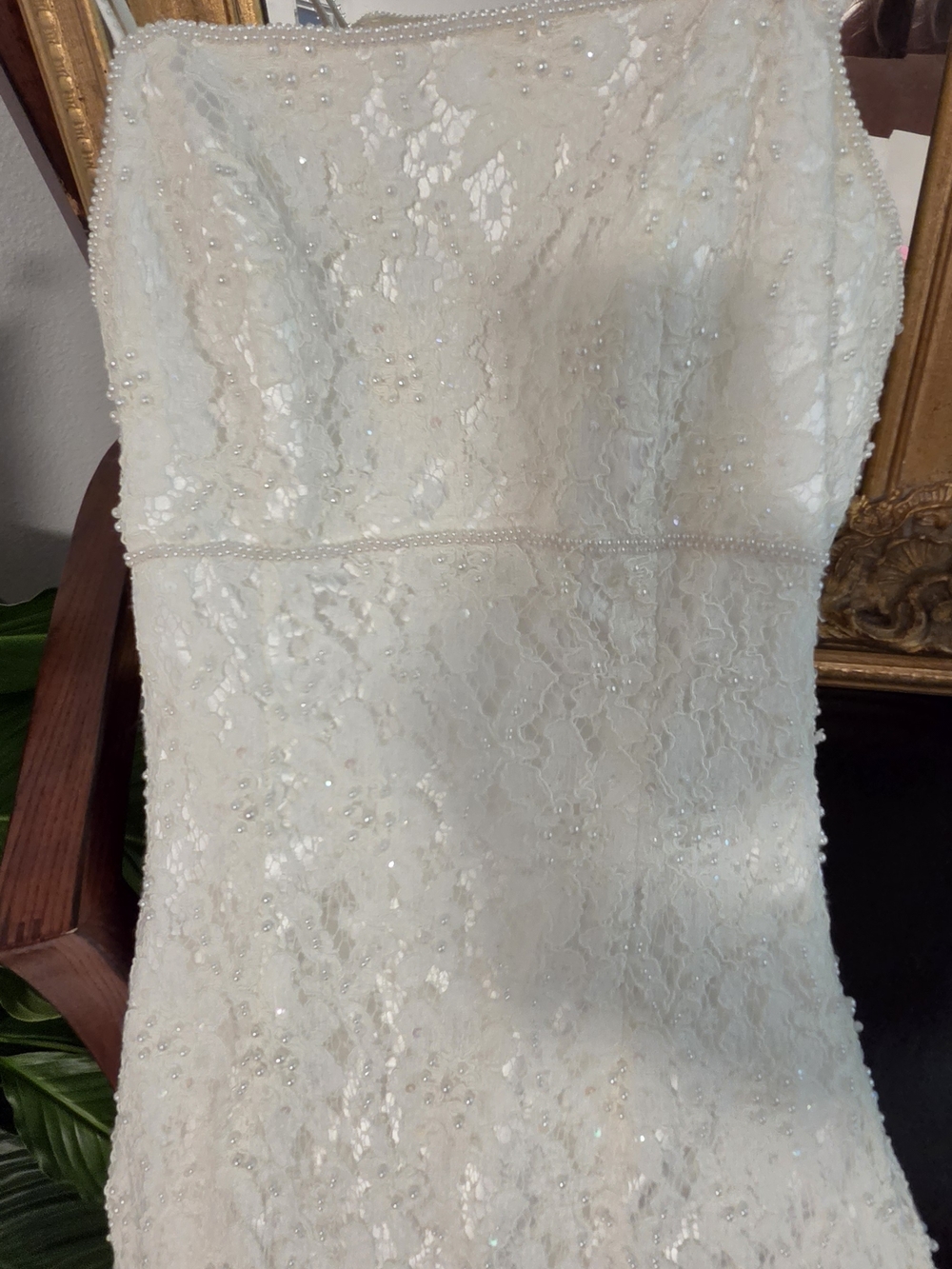 Elegant White Lace Wedding Dress with Beaded Detail